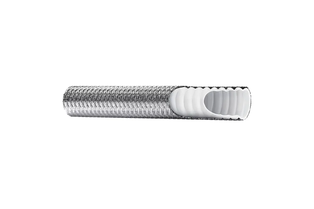 Kup teraz Wąż teflonowy karbowany PTFE z jednym oplotem metalowym CLWB DN06 150bar 0312 - Unigasket